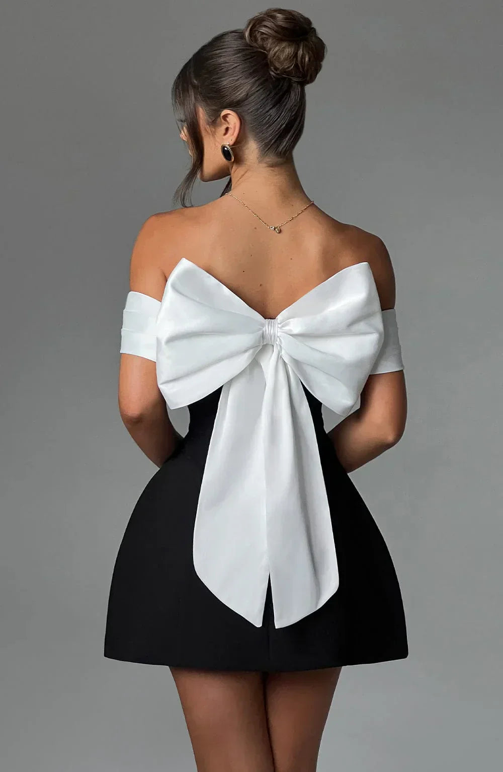 Maud | Chic Mini Dress with Contemporary Bow Accent